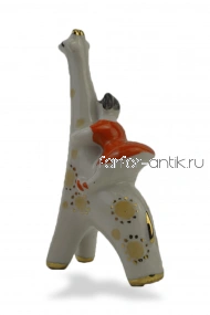 Девочка на жирафе